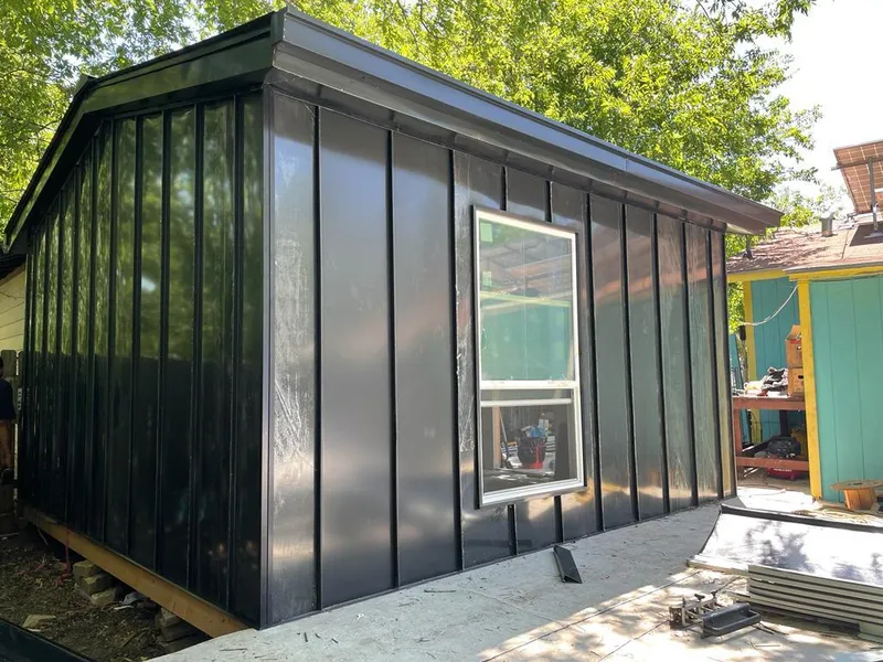 Black standing seam metal wall panels for Roof Inspection in Palm Beach Gardens